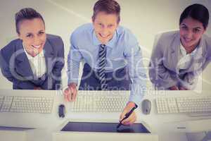 Businessman showing his screen to the team