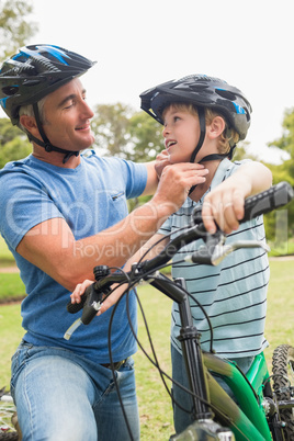 Father on a bike with his son