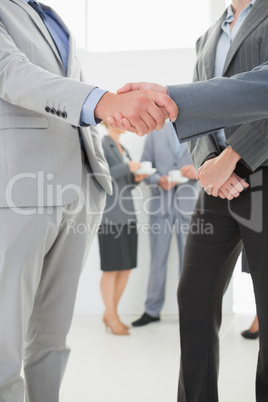 Business people shaking hands