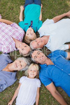 Happy family looking up the camera