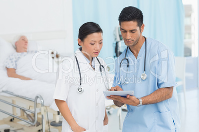 Portrait of confident doctors with arms crossed