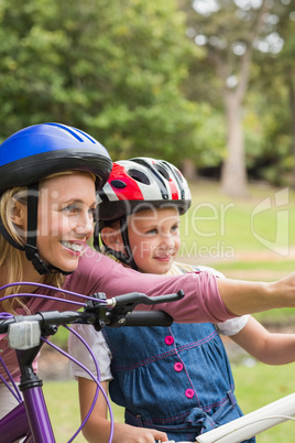 Mother and her daughter on their bike