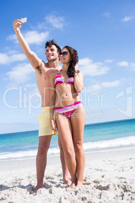 Happy couple taking selfie Happy couple taking selfie