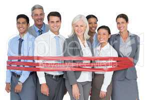 Smiling business people surrounding by red strip