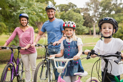 Happy family on their bike at the park