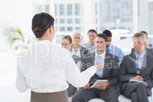 Businesswoman doing speech during meeting