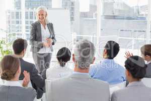 Businesswoman doing speech during meeting