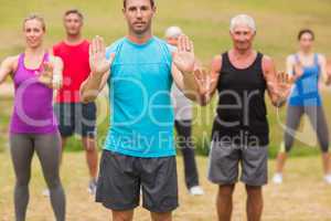 Athletic group showing their hands
