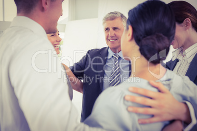 Business team standing in circle