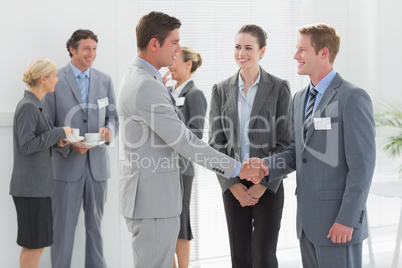 Business people shaking hands