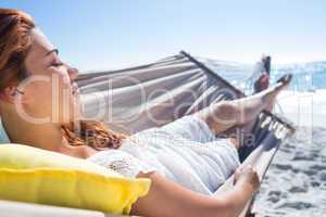 Brunette relaxing in the hammock