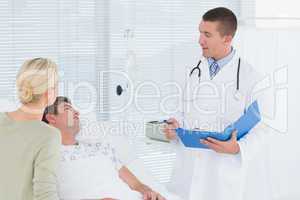 Doctor checking his patient