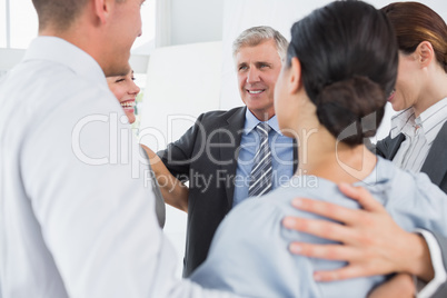 Business team standing in circle