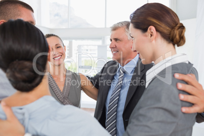 Business team standing in circle