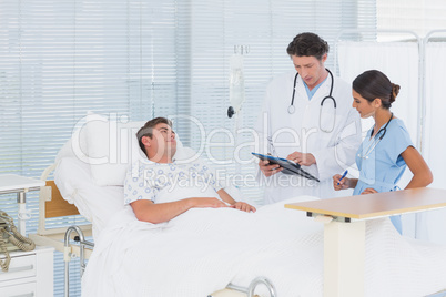 Doctors taking care of patient