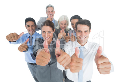 Happy business people looking at camera with thumbs up