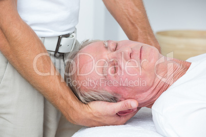 Man receiving neck massage