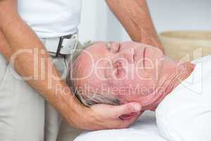 Man receiving neck massage