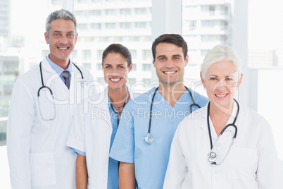 Portrait of confident doctors in row