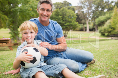 Happy father with his son at the park