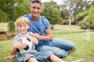 Happy father with his son at the park