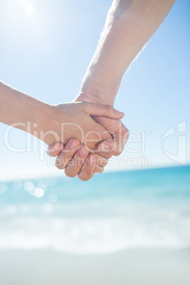 Couple walking hand in hand