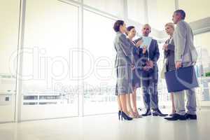 Business team standing and speaking