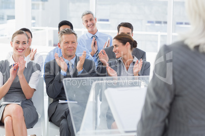 Businesswoman doing speech during meeting