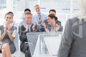 Businesswoman doing speech during meeting