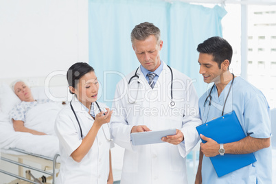 Portrait of confident doctors with arms crossed