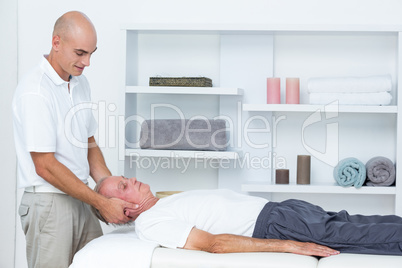 Man receiving head massage