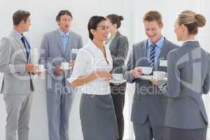 Business people drinking cup of coffee