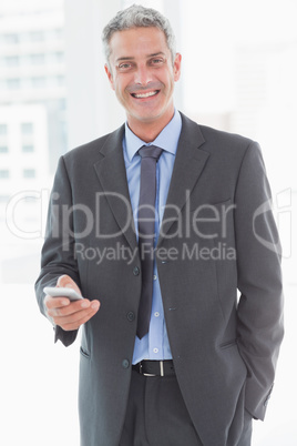 happy business man using smartphone