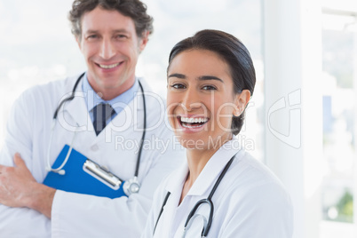 Happy doctors looking at camera Happy doctors looking at camera