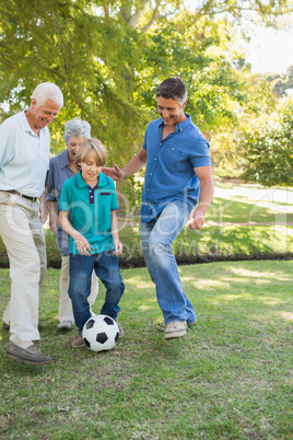 Happy family playing at the ball