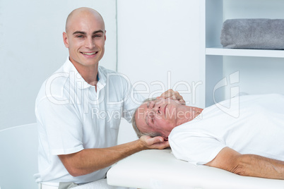 Man receiving head massage