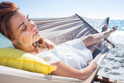 Brunette relaxing in the hammock