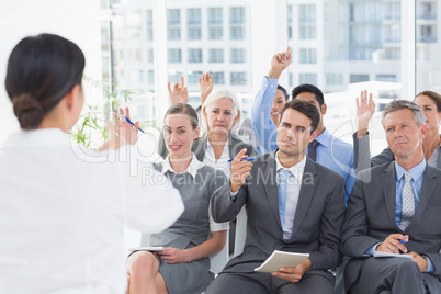 Businesswoman doing speech during meeting