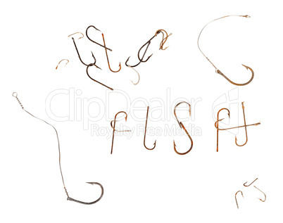Word F I S H and old rusty fish hooks