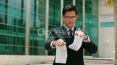 Portrait Chinese Businessman Tearing Contract And Throwing Papers