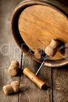 Corkscrew and wooden cask