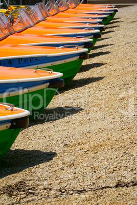 Detail view of pedal boats in a row