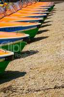 Detail view of pedal boats in a row