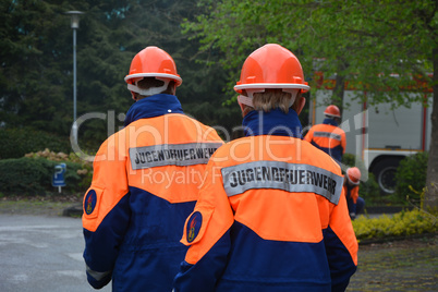 two young fireman in uniform