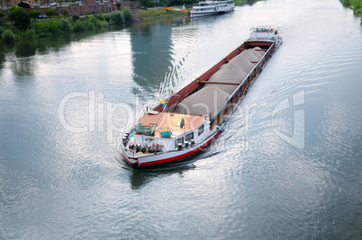 barge with cargo on river