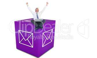 Composite image of excited cheering businessman sitting using hi