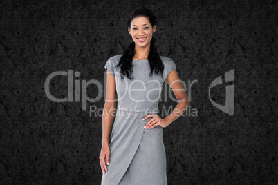 Composite image of businesswoman smiling