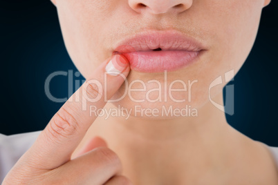 Composite image of woman pointing her lips