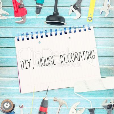 Diy, house decorating against tools and notepad on wooden backgr