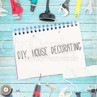 Diy, house decorating against tools and notepad on wooden backgr